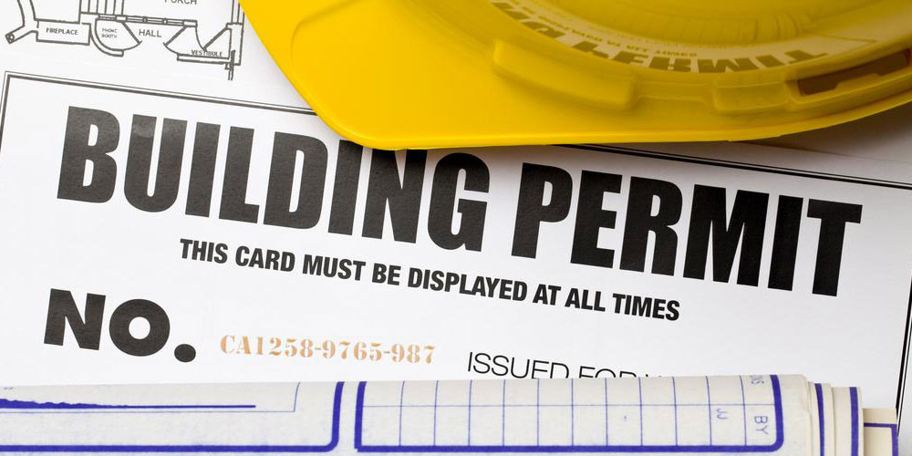 Building permit and a hard hat